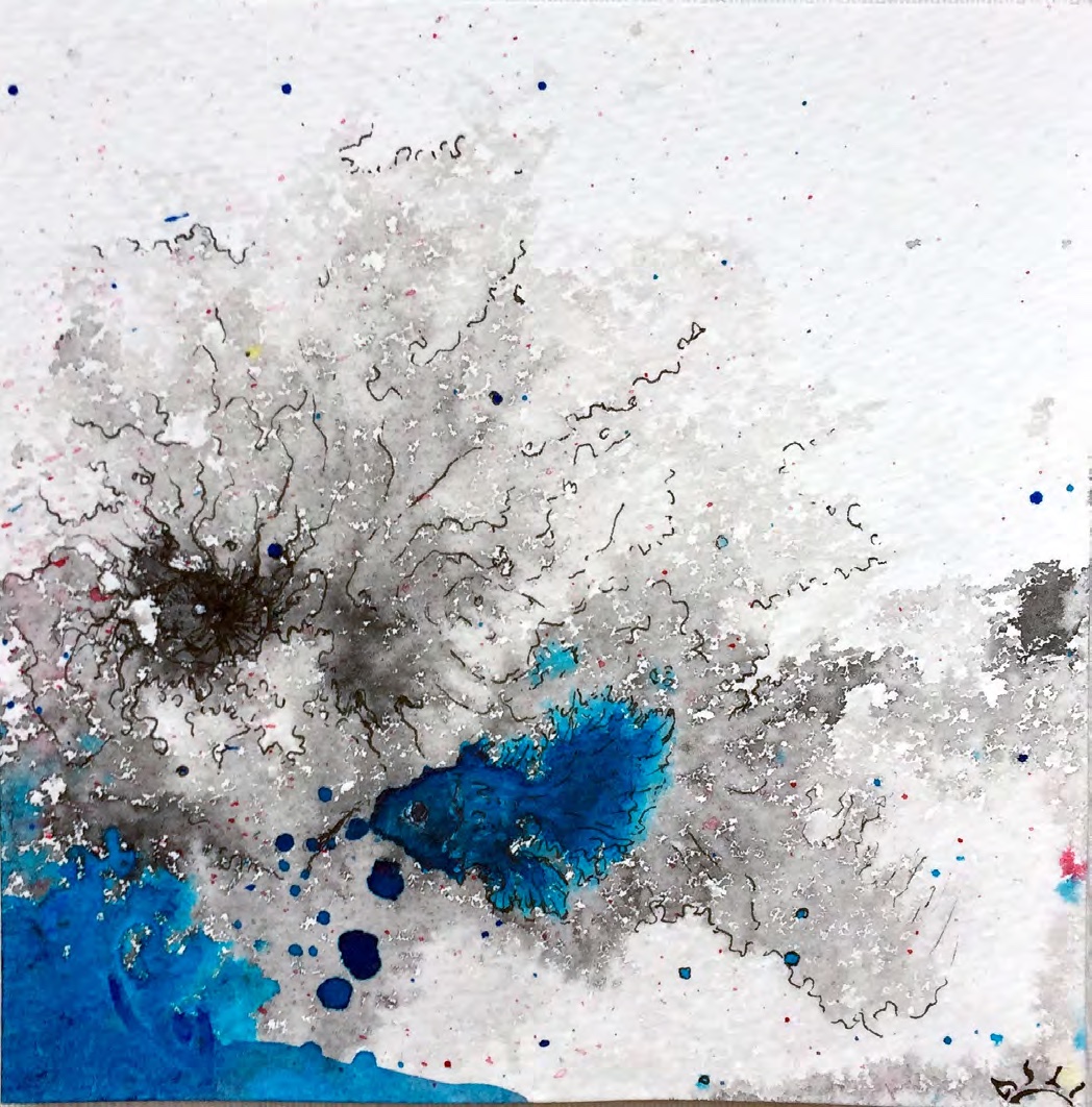 Grey and blue ink marks scattered across white paper.